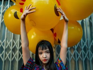 Colorful Confidence with Yellow Balloons